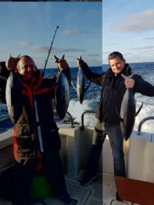 Four Albacore tuna being caught on Silver Dawn